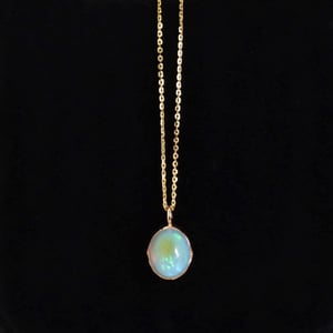 Image of Fire Opal cabochon oval shape 14k gold necklace