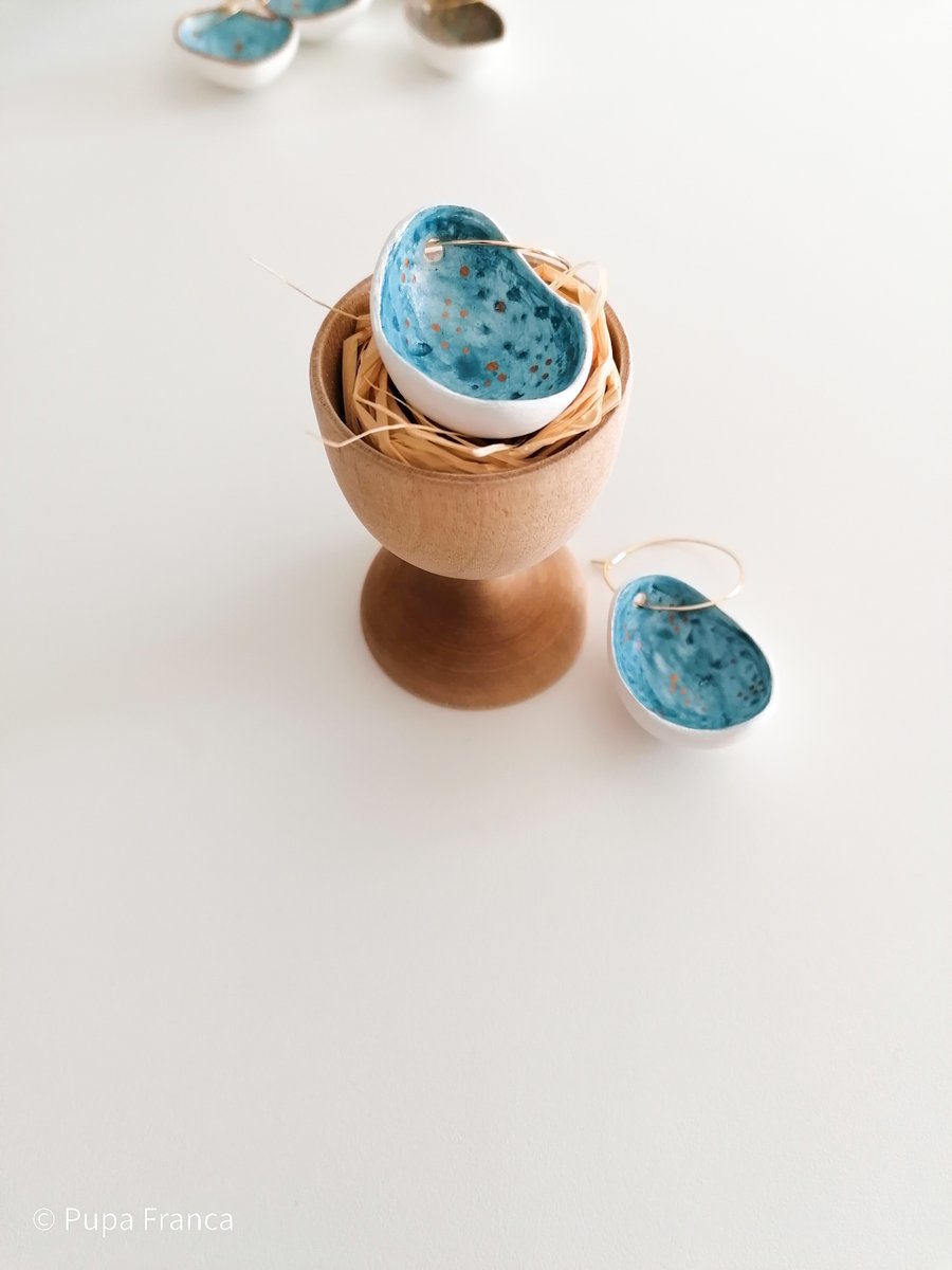 Image of Eggshell Earrings in blue with golden dots