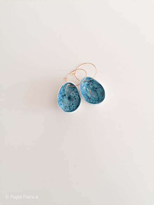 Image of Eggshell Earrings in blue with golden dots 