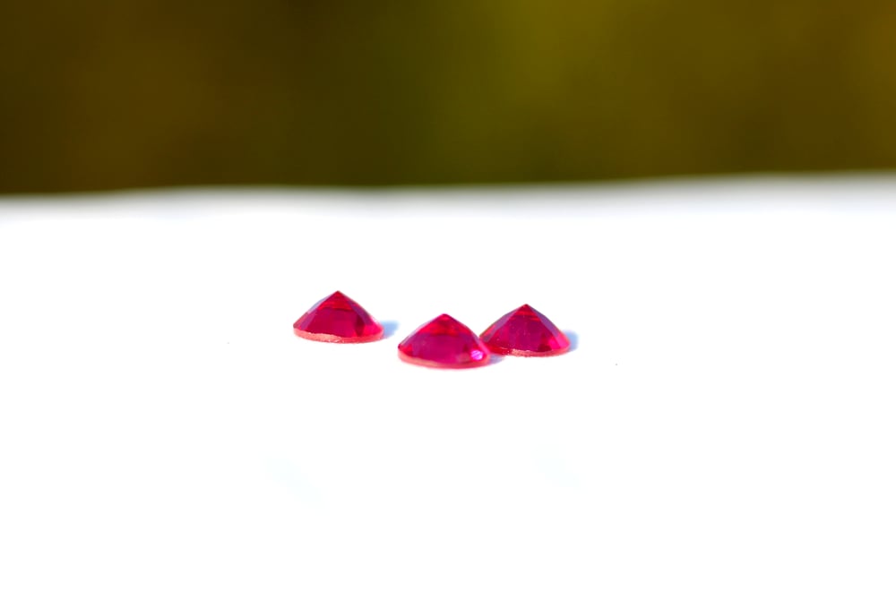 Image of 8mm Ruby Faceted Half Gem