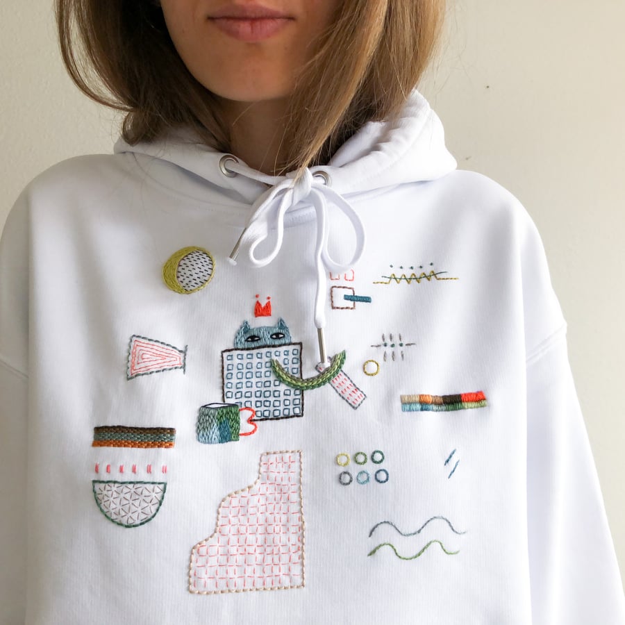 Image of Cat hiding from drama - hand embroidered organic cotton hoodie, Unisex, one of a kind