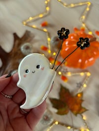 Image 1 of Ghost with flowers 