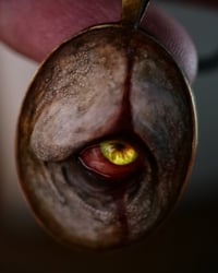Image 13 of Pennywise Eye glow in the dark pendant OOAK