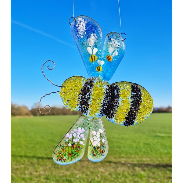 Image of Fused Glass Bee with Textured Flowers.