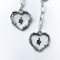 Image 3 of 'Serpent's Heart' // Huggie Earrings
