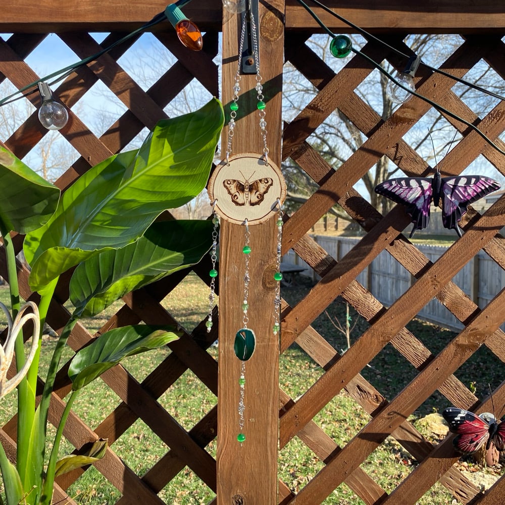 Image of malachite flight sun catcher 