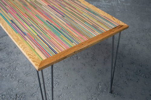 Image of Large broken skateboard and oak table