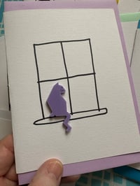 Image 4 of Cat Sitting In A Window