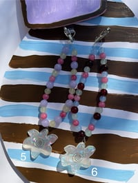 Image 3 of glass bead phone charms with trinket 
