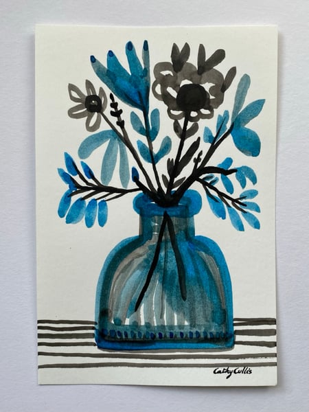 Image of ink bottle with wildflower stems