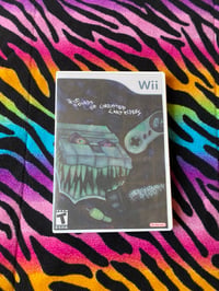 Image 1 of Taxidermy Wii cds 