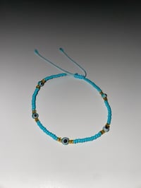 Image 1 of Teal multi evil eye bracelet 