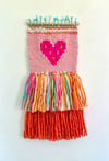 Hot pink & citrus Candy Heart. Woven wall hanging.