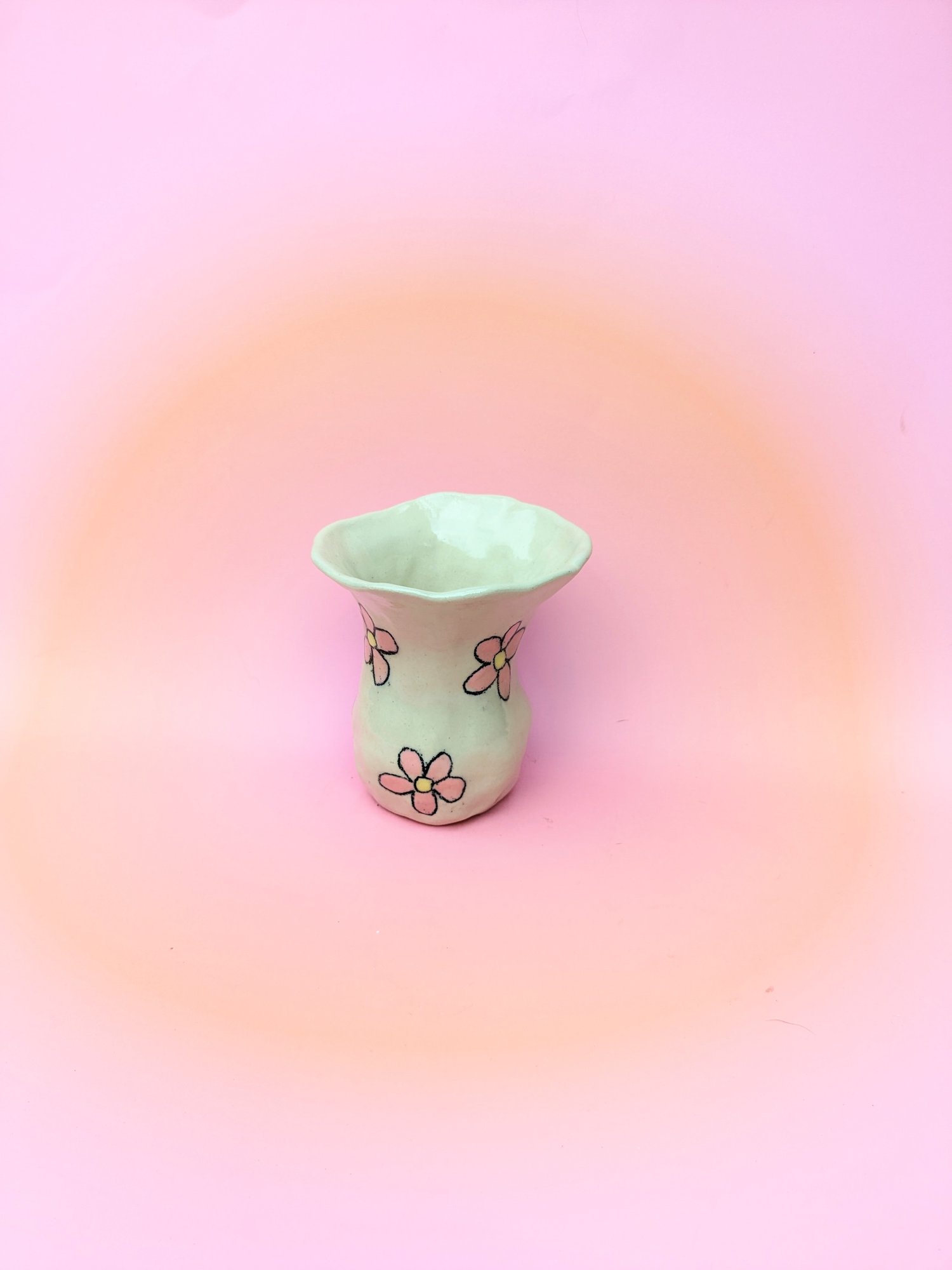 Image of pink and yellow daisy vase