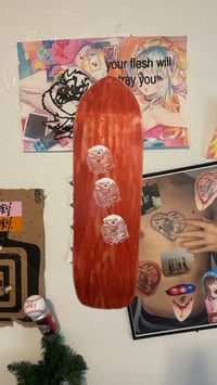 Image 1 of orange peter shaped deck 9.5"