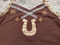 Image 2 of brown with horseshoe
