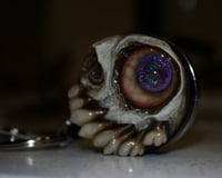 Image 19 of Undead Gaze Badge Reel Keychain