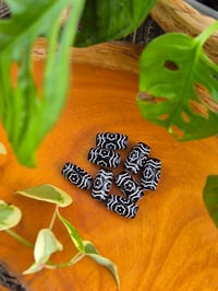 Image 1 of Black and White Flower Beads - Set of 2
