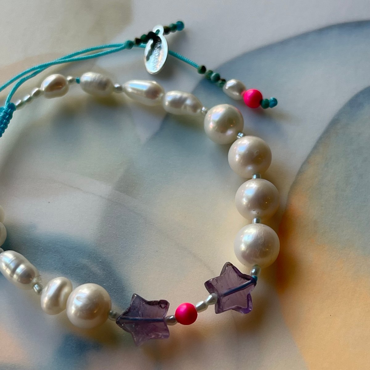 Image of pearl and amethyst bracelet