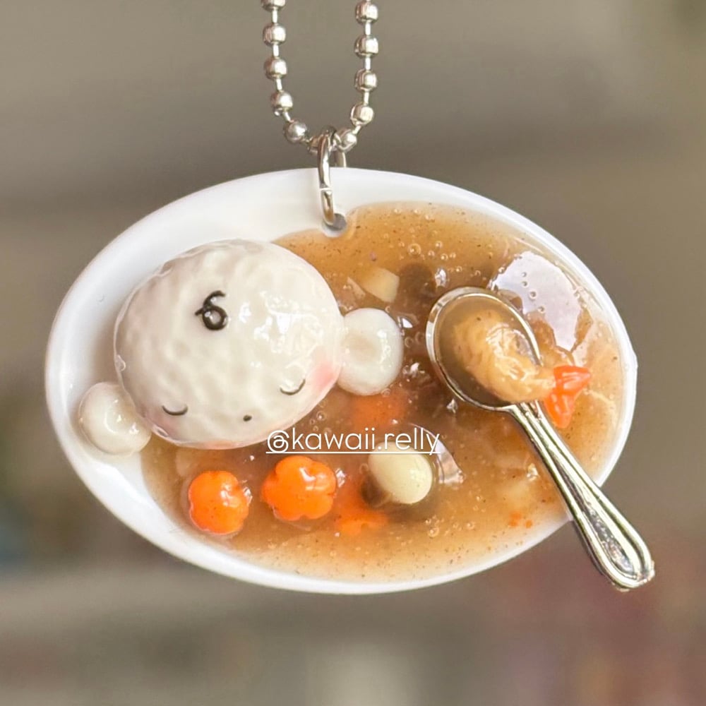 Image of Momo Taking a Curry Nap - ball keychain