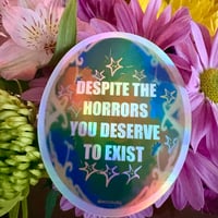 Image 1 of despite the horrors sticker