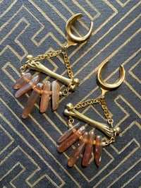 Image 1 of Gold Titanium Agate Femur Bone hanging saddle ear weights