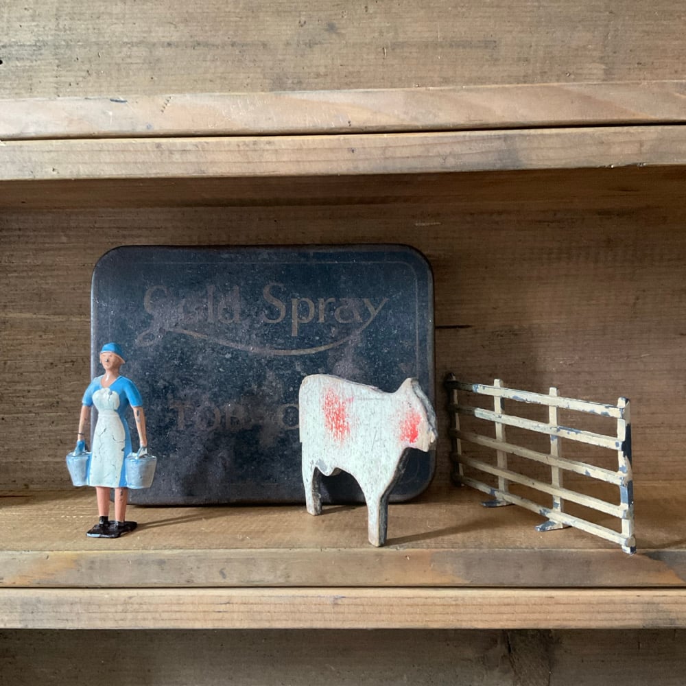 Image of Milkmaid,Cow,Fence & Tin