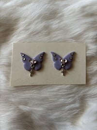 Purple Butterfly Cabs