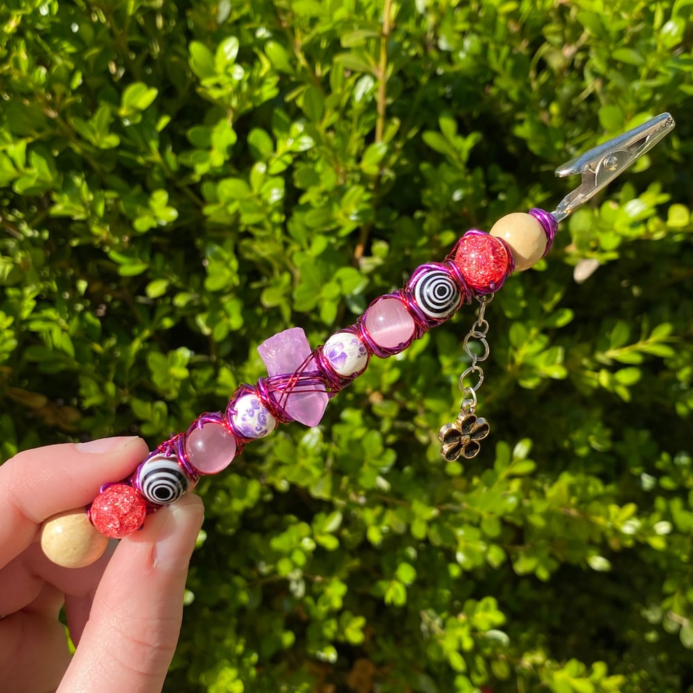Image of violet cherry roach clip 