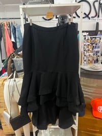 Image 1 of black ruffle bottom skirt