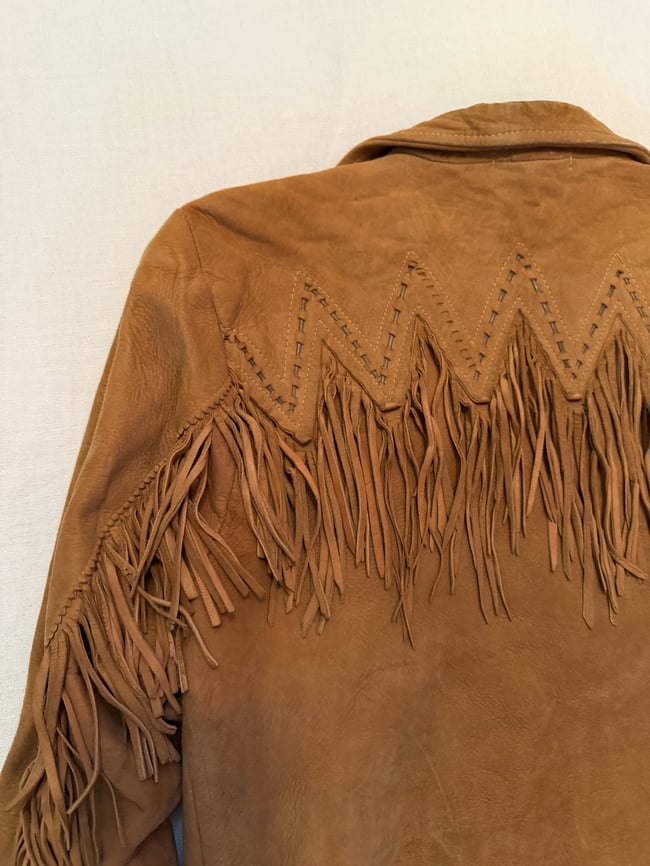late 60s early 70s buttery leather fringe jacket with whipstitching 