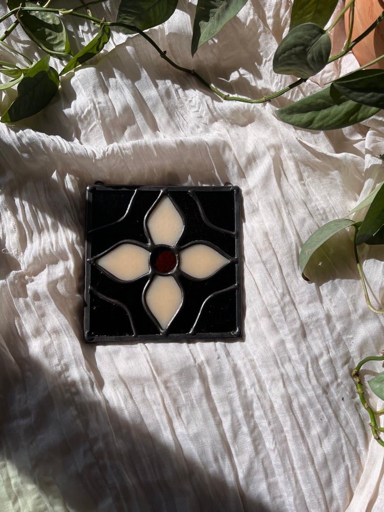 Image of Dark amber flower tile