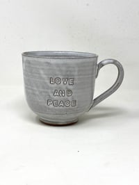 Image 1 of Debossed ‘LOVE AND PEACE’ Mug