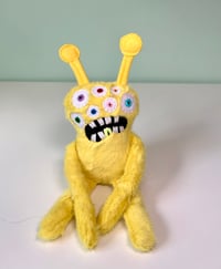 Image 1 of Weighted Multi Eye Alien - Yellow
