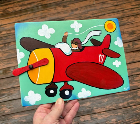 Image of Spirit Bomb Yo-Yo Airplane painting on wood real spinning propeller 