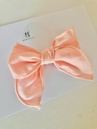 Pale pink sailor bow 