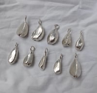 Image 1 of garlic clove in silver 
