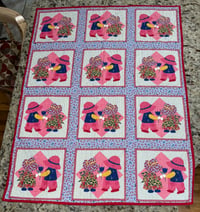 Image 1 of Girl and Boy panel quilt red trim 
