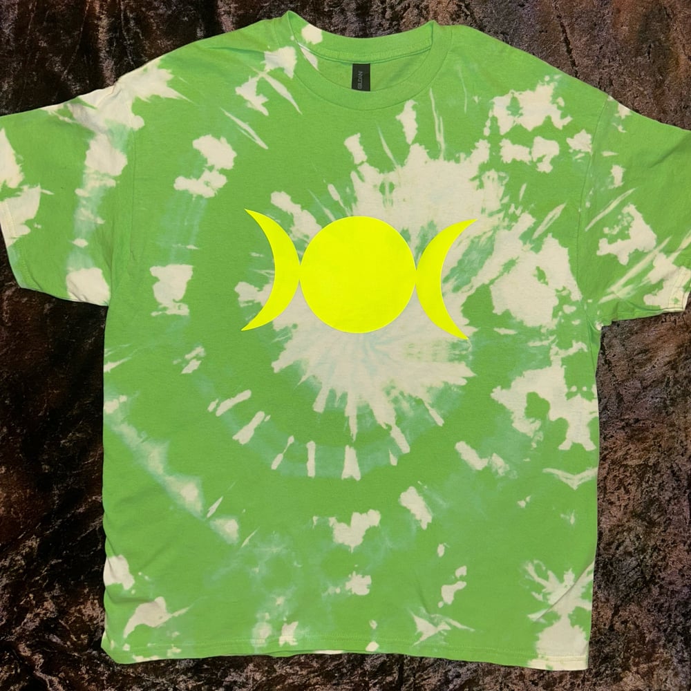 Image of green bleach dye tshirt with triple moon design 