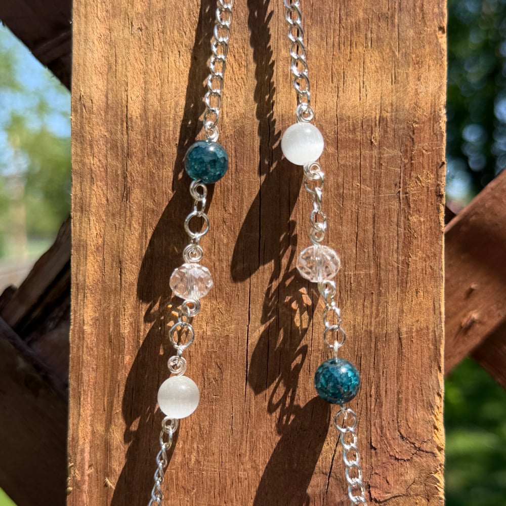 Image of face in the moon sun catcher 