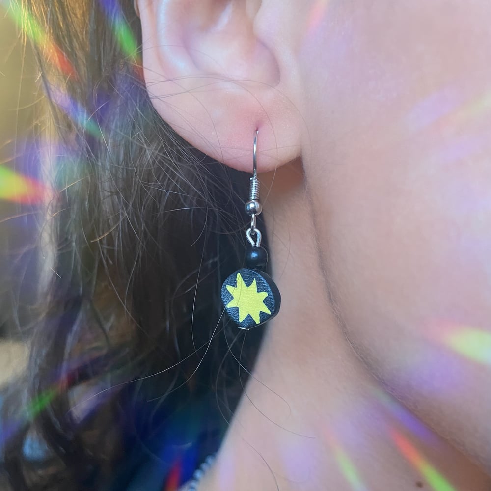 Image of star charm earrings 