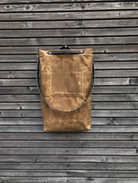 Image 1 of Hobo bag in waxed canvas with vegetable tanned leather handles and crossbody strap