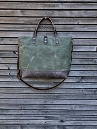Image 3 of Carryall  tote bag in olive green waxed filter twill with leather bottom and cross body strap