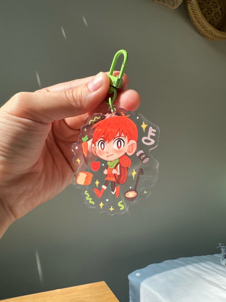 Image of Dungeon Meshi Chillchuck Double Sided Acrylic Keychain 2.5”