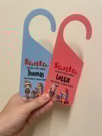 Image 1 of Santa Stop Here Hangers 