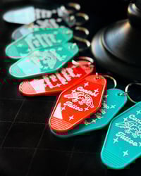 Image 2 of Florida motel keychains