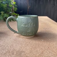 Kaffe & Krimi Hank Mørkegrøn