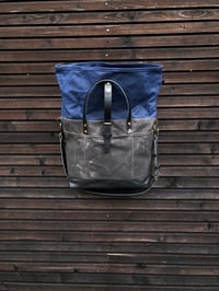 Image 4 of Waxed canvas roll to close top tote bag with luggage handle attachment leather handles and shoul