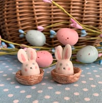 Image 2 of Ceramic Cute Pink Cheek Bunny in a basket.