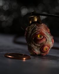 Image 16 of Egg of the King pendant, leather cord, brass hardware, all seeing glowing eyes